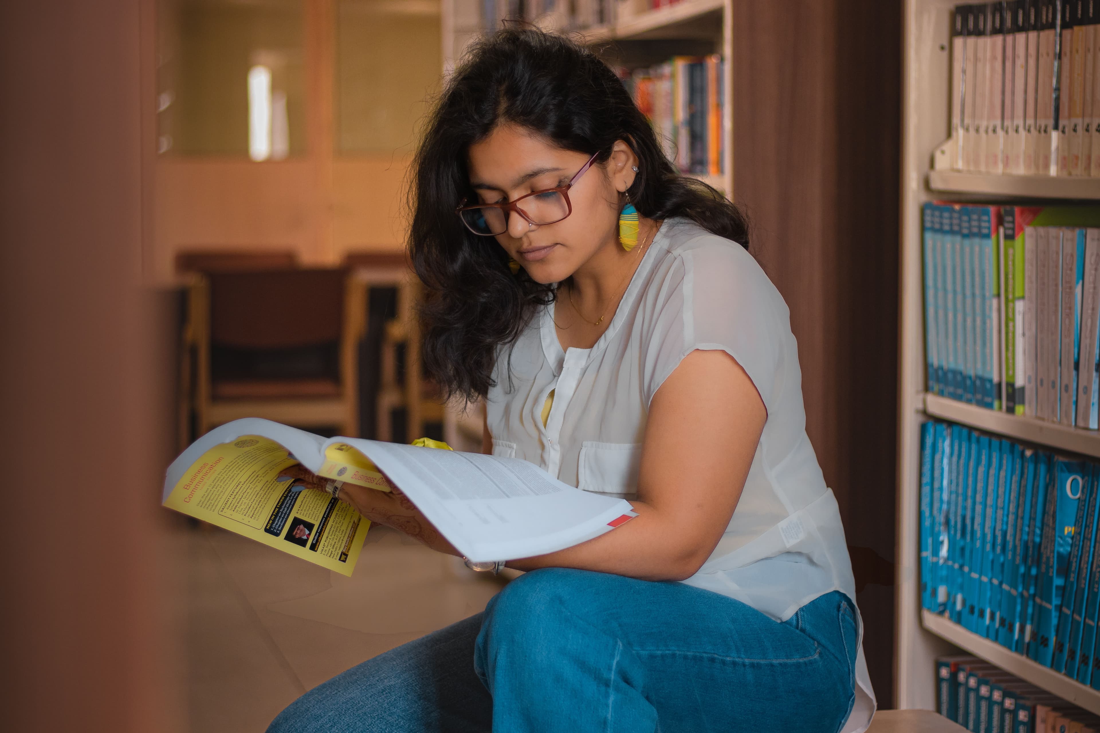 Aspirants studying together in a library